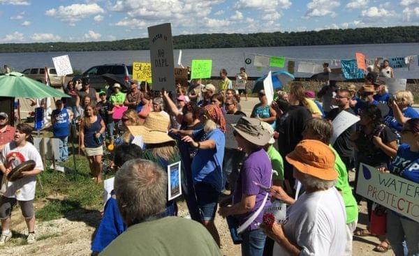 Supporters prepare to take the hill and trespass onto the property controlled by Dakota Access.