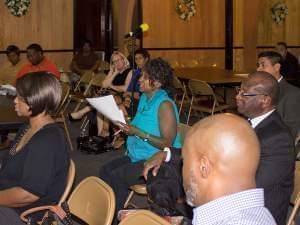 Champaign County NAACP President Patricia Avery asks questions of the Citizen Review of Complaints Working Group Monday at Mt. Olive Missionary Baptist Church in Champaign.