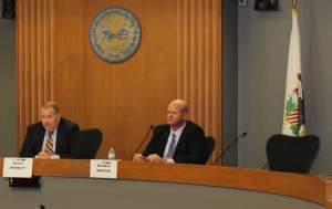 Urbana Alderman and Senate candidate Mike Madigan (R) debates incumbent Scott Bennett of Champaign on October 5 at the Champaign City Building. 