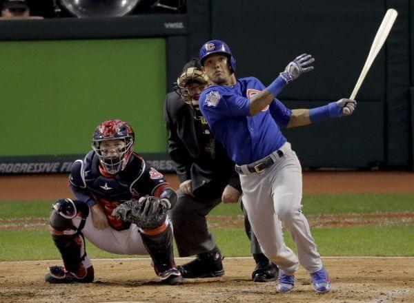 Chicago Cubs' Addison Russell watches his grand slam against the Cleveland Indians during the third inning of Game 6 of the World Series Tuesday, Nov. 1, 2016, in Cleveland.