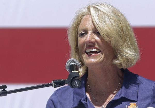 This Aug. 17, 2016, file photo shows, then Republican Illinois state Comptroller Leslie Munger in Springfield, Ill. Illinois Gov. Bruce Rauner has hired former state Comptroller Munger to serve as a deputy governor.