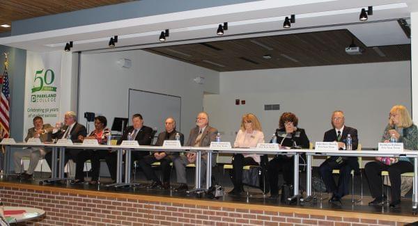 Candidates for Parkland College's Board of Trustees gather in the Student Union cafeteria for Monday's debate.