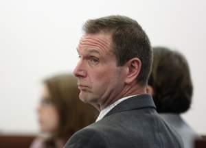 Curtis Lovelace looks over at the prosecutors during his first-degree murder trial Monday, March 6, 2017, at the Sangamon County Courthouse in Springfield.