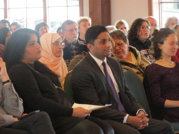 Ameya Pawar attended an immigrant rights rally in Peoria on Sunday. He says his parents emigrated from colonial India to escape poverty. 