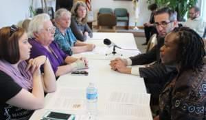 State Rep. Carol Ammons and Rep. Will Guzzardi are joined by a panel of home health care workers