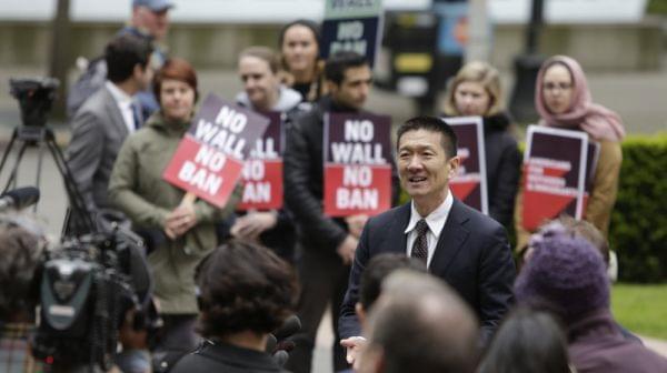 Hawaii Attorney General Doug Chin speaks to media outside the 9th Circuit U.S. Court of Appeals in Seattle, Washington, on May 15, 2017. The court has largely upheld a preliminary injunction blocking President Trump's travel ban from going into 