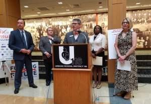 Urbana School Dis. Supt. Don Owen, flanked by are St. Senators Andy Manar & Scott Bennett, St. Rep. Carol Ammons and Urbana Mayor Diane Marlin.