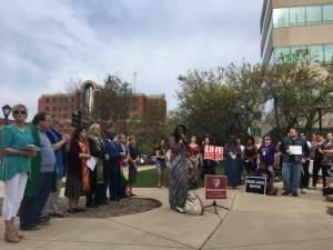 Theresa Haley of NAACP's Illinois addresses a vigil in Springfield