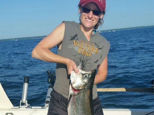 Recreational angler Carol Sabaj of Champaign with a 14lb Chinook (King) Salmon caught in July on Lake Michigan out of Waukegan Harbor, Waukegan IL.