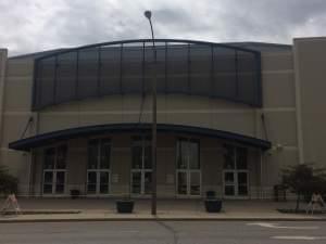 Five former Coliseum managers face felony charges.