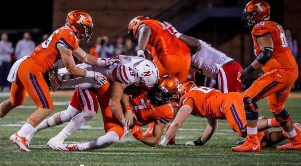 Nebraska Linebacker Chris Weber (49)  tackles Illinois quarterback Chayce Crouch (7) in Nebraska's 28-6 win Friday night.