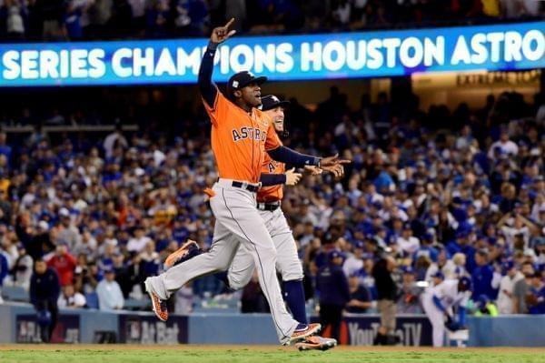 Cameron Maybin and George Springer of the Houston Astros celebrate after winning the team's first World Series title. 