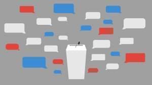 Podium with red, white, and blue word bubbles.