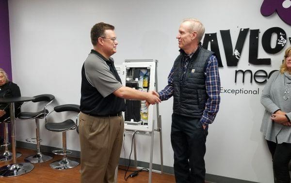 Pavlov Media CEO Mark Scifres and Gov. Bruce Rauner.