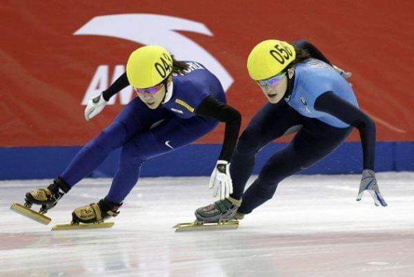 Katherine Reutter-Adamek (right) skating in Shangai in 2011.