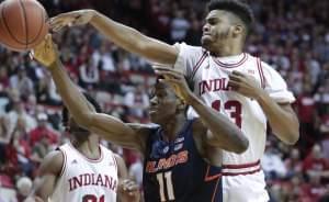 Indiana forward Juwan Morgan blocks the shot of Illinois forward Greg Eboigbodin.