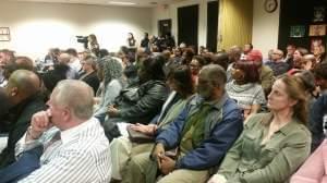 Attendees pack a public hearing on a proposed charter school in Champaign's Unit 4 school district on Monday, April 9, 2018. 