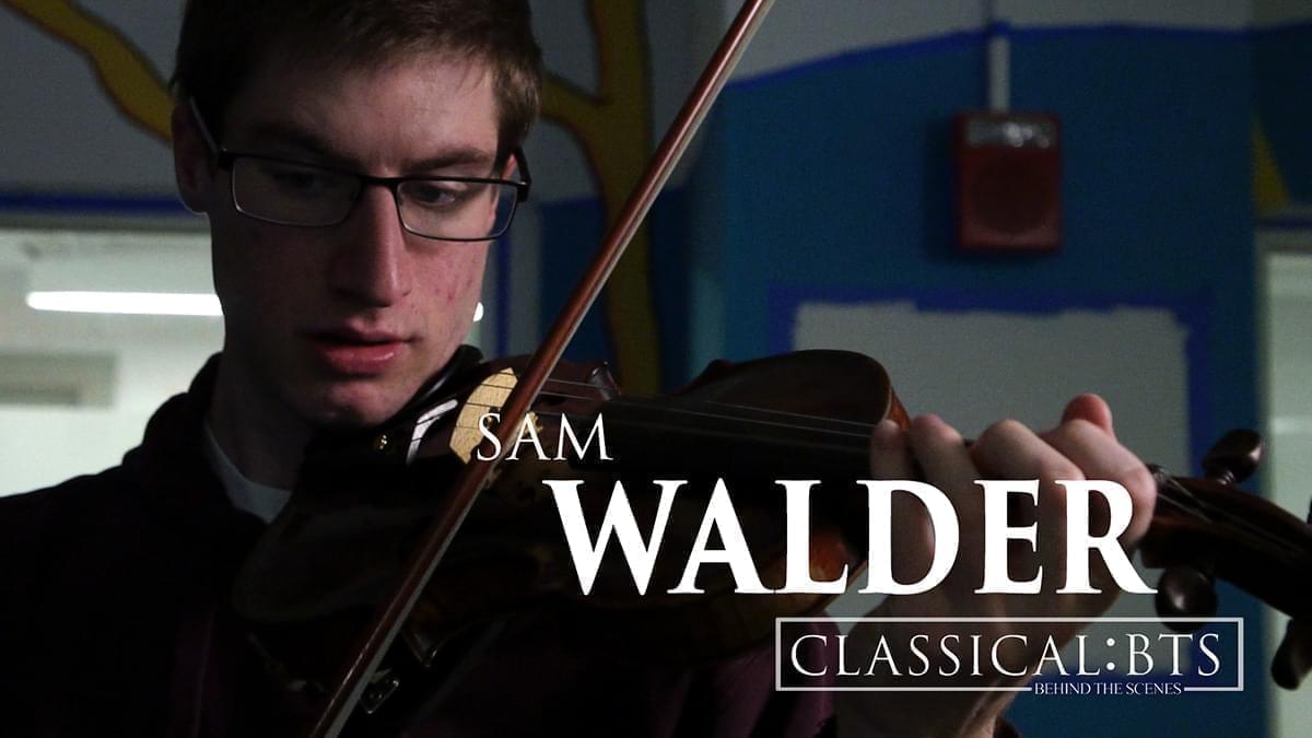 Sam Walder playing a violin