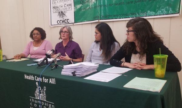 Claudia Lennhoff and other members of Champaign County Health Care Consumers.