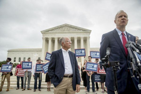 Illinois Governor  Bruce Rauner and plaintiff Mark Janus.