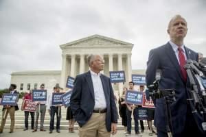 Illinois Governor  Bruce Rauner and plaintiff Mark Janus.