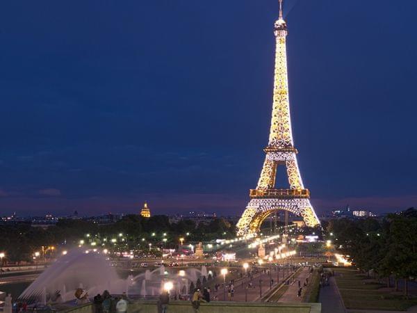 The Eiffel Tower at night in Paris, France.