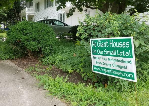 "No Giant Houses" sign in the front yard of a home in Champaign's Clark Park neighborhood.