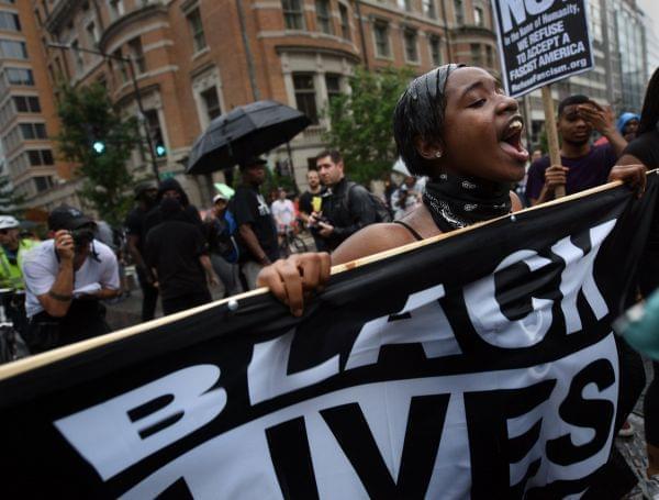 Counterprotesters stage a protest against right wing extremists' 'Unite The Right 2' rally. 