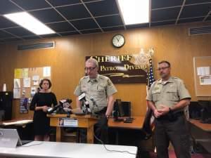 Champaign County State's Attorney Julia Rietz, Champaign County Sheriff Dan Walsh, and Chief Deputy Allen Jones.