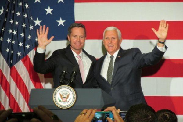 Congressman Rodney Davis, left, greets supporters alongside Vice President Mike Pence at a fundraiser in Springfield on Oct. 12.