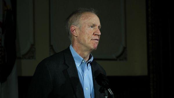 Gov. Bruce Rauner speaks with Statehouse reporters on Nov. 29, 2018.