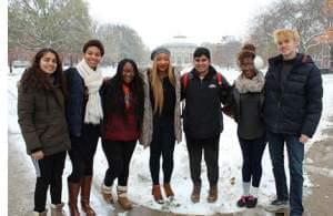 U of I students standing outside on the campus. The YouMatter Studios team includes (from left to right) Sanskriti Khurana, Adia Ivey, Daja Wilson, Jewel Ifeguni, Vignesh Sivaguru, Deborah Agoye, and Jake Pisarski.