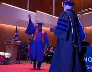 Perry Cline at Cline's graduation from the University of Illinois' School of Social Work program on Dec. 16, 2018.