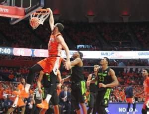 Illinois freshman Giorgi Bezhanishvili slams home two points during Illinois' 79-74 win over #9 Michigan State Tuesday night in Champaign.