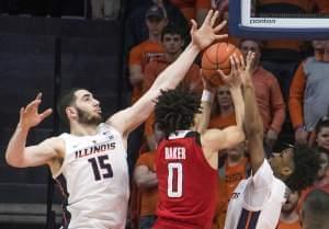 Illinois forward Giorgi Bezhanishvili and guard Trent Frazier, right, guard Rutgers guard Geo Baker in the second half of an NCAA college basketball game in Champaign, Ill., Saturday, Feb. 9, 2019