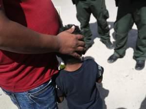 father and son at US-Mexico border