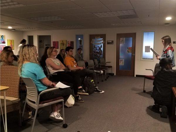 Bridgette Jasinski, of Students Against Sexual Assault, shared an anonymous story in front of a crowd of about thirty people at the Women's Resources Center at the University of Illinois Tuesday night. 