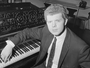 Van Cliburn sitting at the piano