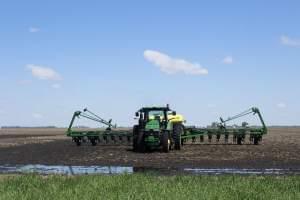 A tractor idled in a field that was too wet to farm in central Illinois this spring.