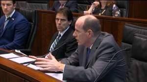 State Sen. Bill Cunningham (D, Chicago) questions a panel of university lawyers and trustees at a hearing in Chicago on Aug. 27.