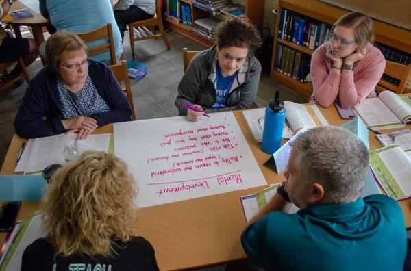 Storm Lake District teachers participate in an activity for Youth Mental Health First Aid. The course teaches educators how to spot mental illness in kids and how to get them help.