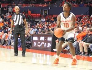 Andre Feliz squares up for a three-pointer during Illinois' 78-70 overtime win over Nicholls State.