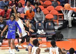 Alan Griffin follows through on a three-point shot during the Illini's 120-71 win over Hampton Saturday in Champaign. 