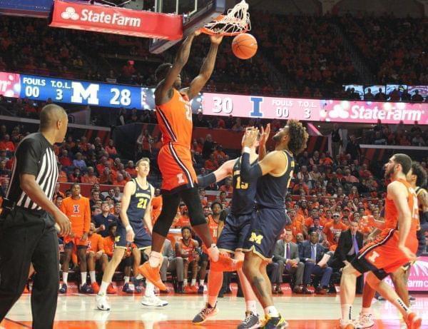 Kofi Cockburn slams in two of his 19 points during Illinois' 71-62 win over Michigan on Wednesday in Champaign.