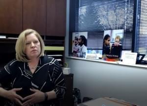 Susan Zola seated in her office