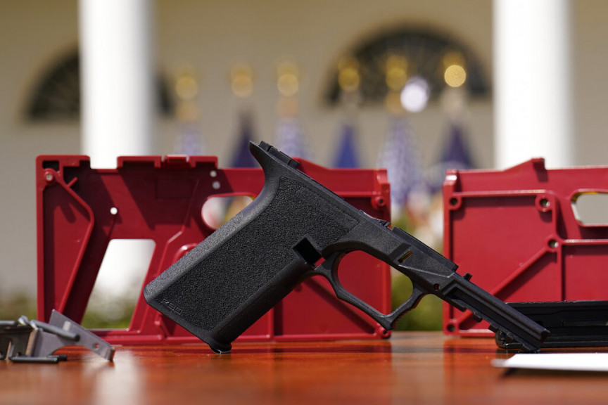 A 9mm pistol build kit with a commercial slide and barrel with a polymer frame is displayed before President Joe Biden and Deputy Attorney General Lisa Monaco speak in the Rose Garden of the White House in Washington, Monday, April 11, 2022, to announces a final version of its ghost gun rule, which comes with the White House and the Justice Department under growing pressure to crack down on gun deaths.