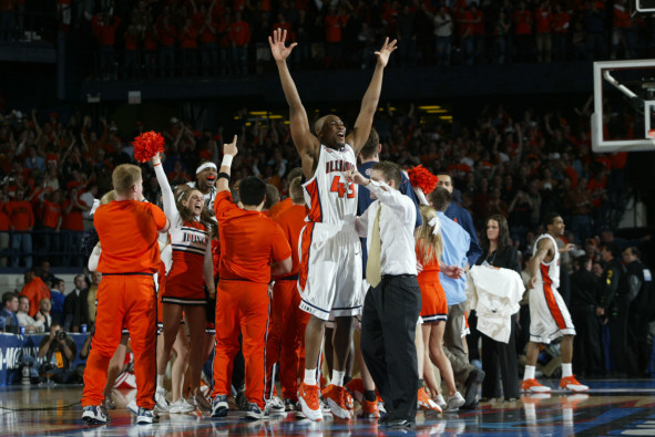 Illinois Basketball player Roger Powell, Jr. celebrates with teammates and staff after defeating Arizona to move on to the 2005 Final Four.
