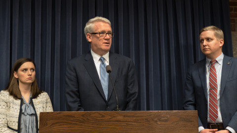 House Republican Leader Jim Durkin, center, is flanked by members os his leadership team in this file photo from February 2020.  State Reps. Avery Bourne, left, and Tom Demmer both chose to seek statewide office rather than run for re-election. Now Durkin is stepping down from his position.