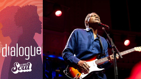 man singing and playing guitar