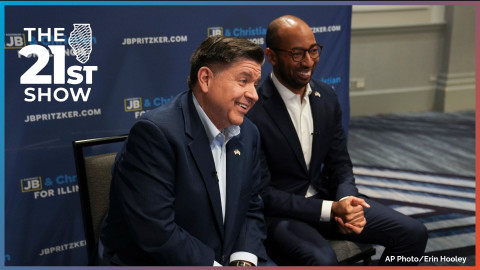 Illinois Gov. JB Pritzker, left, and running mate, candidate for lieutenant governor, Christian Mitchell speak during an interview, Wednesday, March 18, 2026, in Chicago.